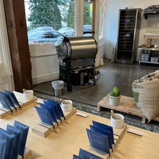 a coffee shop with a coffee grinder in the background