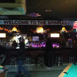 a pool table and a bar