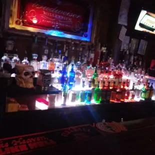 a bar filled with liquor bottles