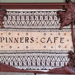 a sign for spinners cafe