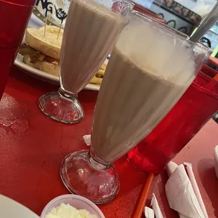 two glasses of milkshake
