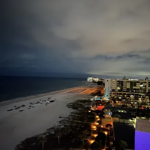 a view of the beach at night
