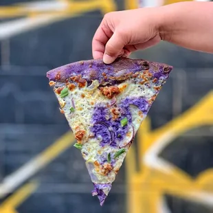 Ube pizza launched May 2023 (Béchamel, ube ricotta, potatoes, sausage, red onion, and green onion)