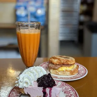 a slice of ice cream pie and a glass of orange juice