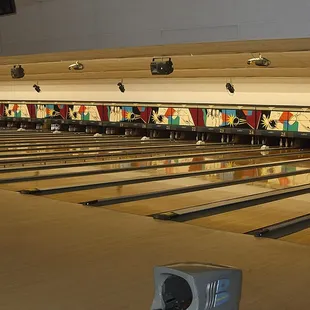 a bowling alley with bowling lanes