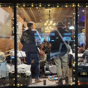 View from outside. The Bored is jamming tonight.