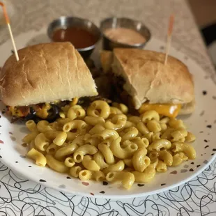 Philly cheesesteak with Mac and cheese.
