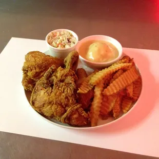 Broasted Chicken with Coleslaw, JoJo&apos;s, and Mashed Potatoes and Gravy.    Local Favorite