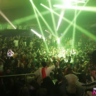 a crowd of people at a nightclub