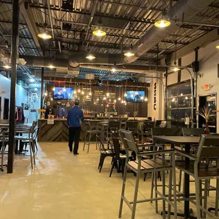 a view of the bar and dining area