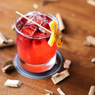 a cocktail with a garnish garnish garnish garnish garnish garnish garn