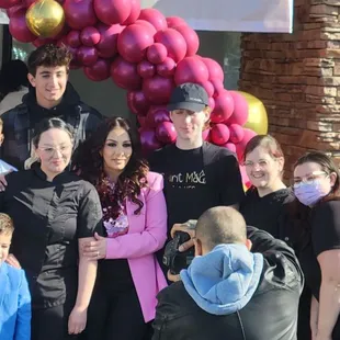 Grand opening, the owner in pink.