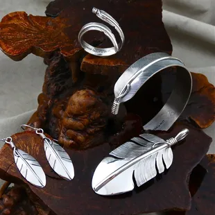 Sterling Silver Eagle feather jewelry by Navajo Artist  Lena Platero