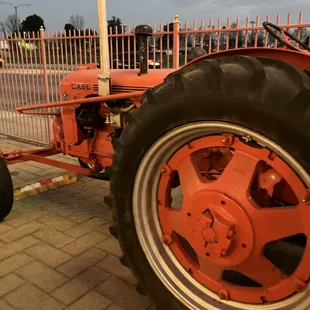 Tractor in front of restaurant