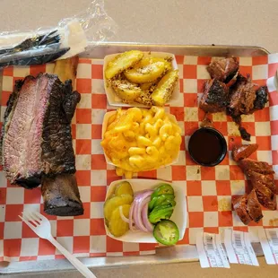 Prime beef rib quarter pound of burnt ends and a quarter pound of sausage.