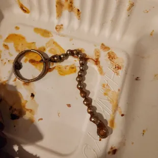 A key chain in our baked beans.