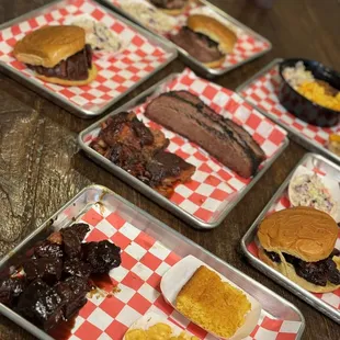 four trays of food