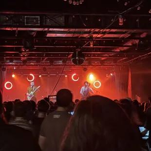 a band performing on stage at a concert