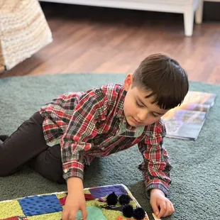 Playing with a sensory toy.