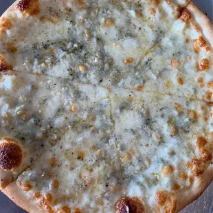 GORGONZOLA BIANCO pie (olive oil, fresh garlic, mozzarella, and gorgonzola) on a traditional, thin-crust pizza