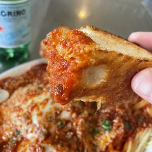 Veal Parmigiana. Thick garlic bread