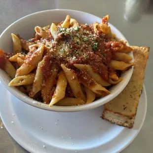 BEEF and PORK SUNDAY GRAVY with penne and toasted country bread with olive oil and garlic