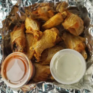 My 10 wing order, naked with sauce on the side, seriously just toss them