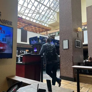  person walking through the lobby