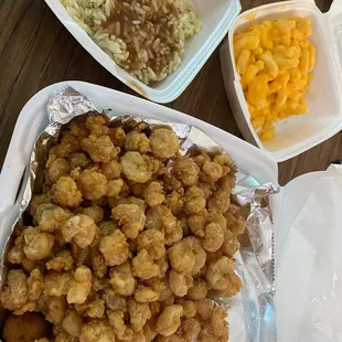 Popcorn shrimp with Mac n cheese and rice and gravy.