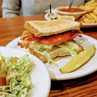 Half BLT sandwich and side Caesar salad combo, $10.99
