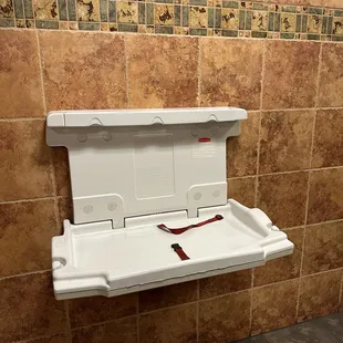 Changing table in women's bathroom