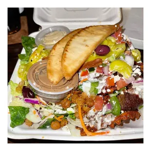 a salad with pita bread