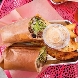 a sandwich and fries on a tray