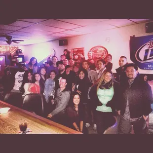 a group of people posing for a picture