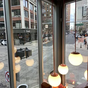 a view of a city street through a window