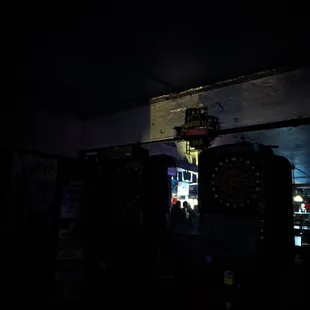 a view of a bar with lights on