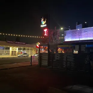 the outside of a motel at night