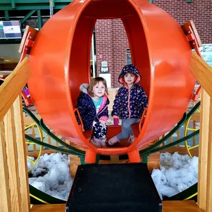 The girls loved the pumpkin carriage in the entryway.