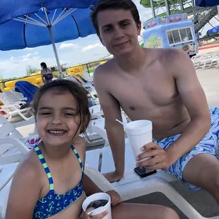 Family having fun with 1$ slushees!