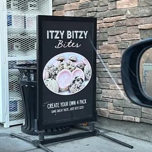 a sign that says itzy bizzy bites