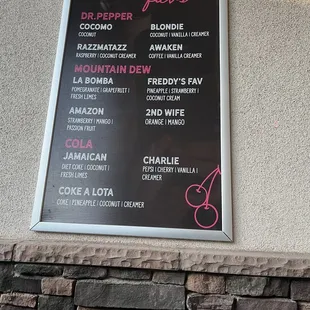a menu on the wall of a restaurant