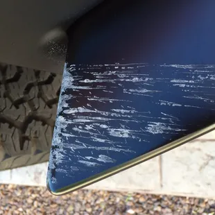 Touchless "wash" couldn't even handle a little bit of mud on the front bumper