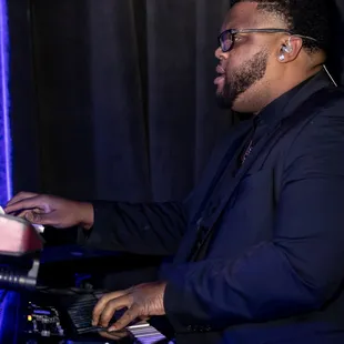 a man playing a keyboard