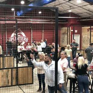 a crowd of people at a beer tasting
