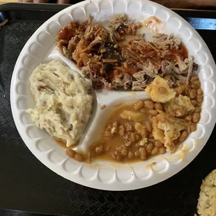 Chopped pork, baked beans, mashed potatoes