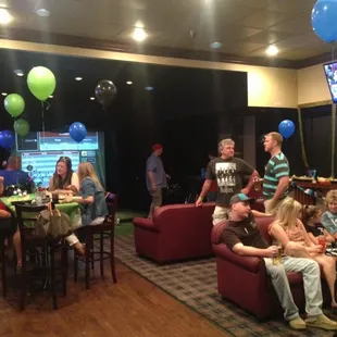 a group of people sitting around a table