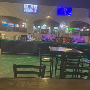 In the bar area in from the bowling alley