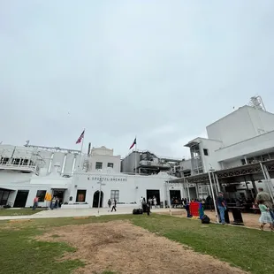 people standing in front of the building