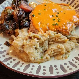 Chicken parmesean with pimento sauce smashed potatoes and brussel sprouts.  Amazing!
