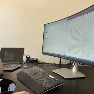 Workspace with sizable monitor, keyboard and mouse, Wi-Fi--easy hook up. Nice chairs, desks can be positioned for standing.